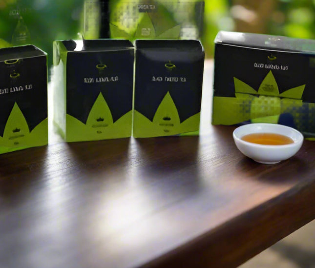 Tea packages with visible branding on a white background