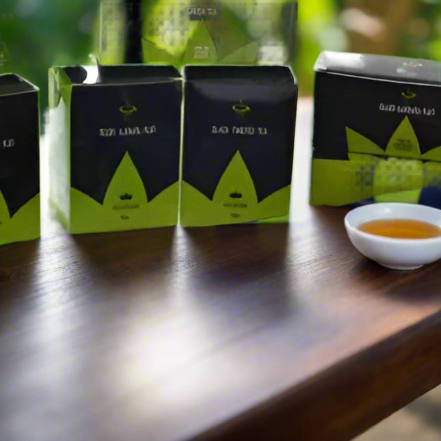 Tea packages with visible branding on a white background